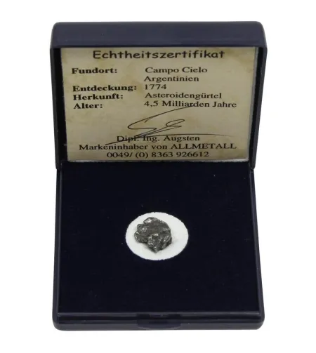 Geležinis meteoritas Campo del Cielo dovanų maišelyje